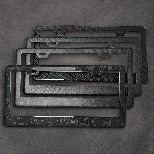 Set of carbon fiber texture license plate frames on a white background